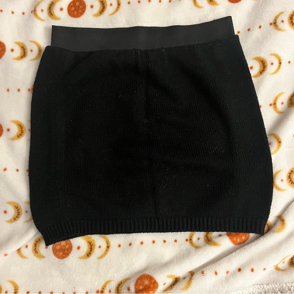 Black knit mini skirt